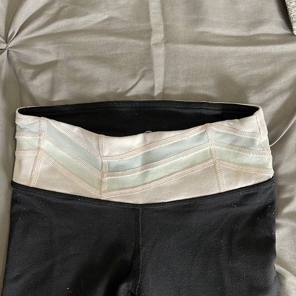 Lululemon black leggings with pink waistband, fits size 2-4 - Picture 2 of 3